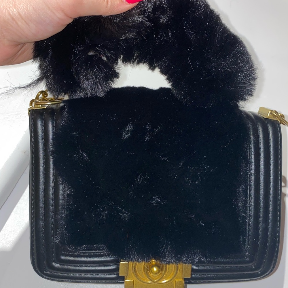 Black fur hand bag